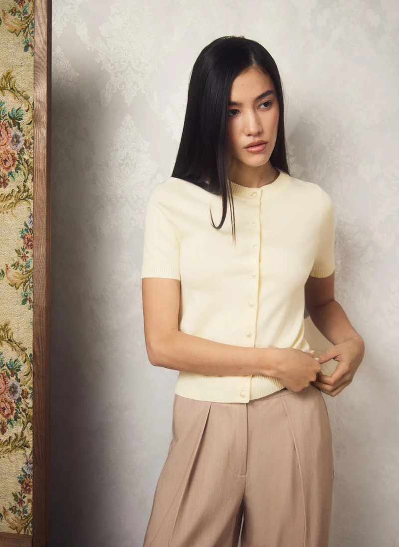 Lichi Cardigan with short sleeves and pearl buttons