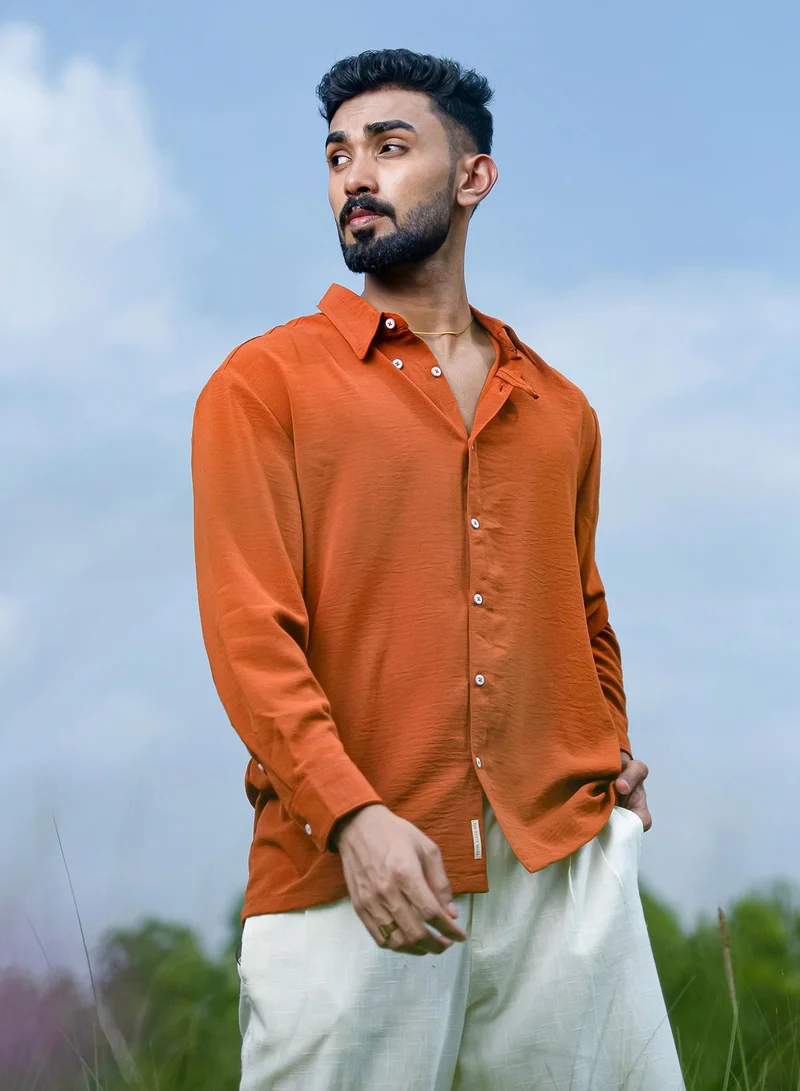 كامبوس سوترا Men's Rust Orange Breezy Wrinked Shirt For Casual Wear | Spread Collar | Long Cuffed Sleeves | Button Closure | Shirt Crafted With Comfort Fit For Everyday Wear