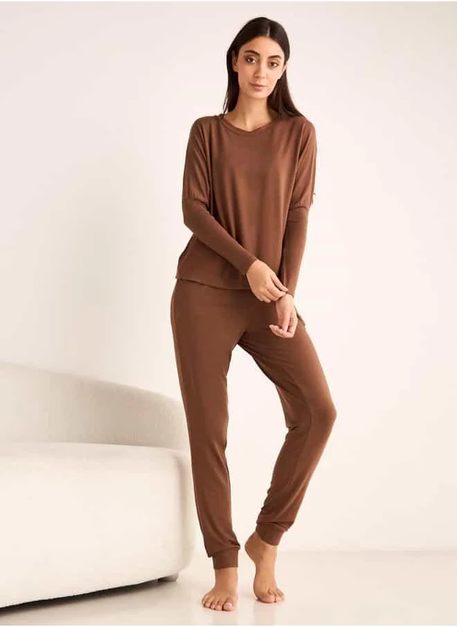 Aadaraya Aadaraya Drop Shoulder Long Sleeve T-shirt and Elasticated Joggers Set