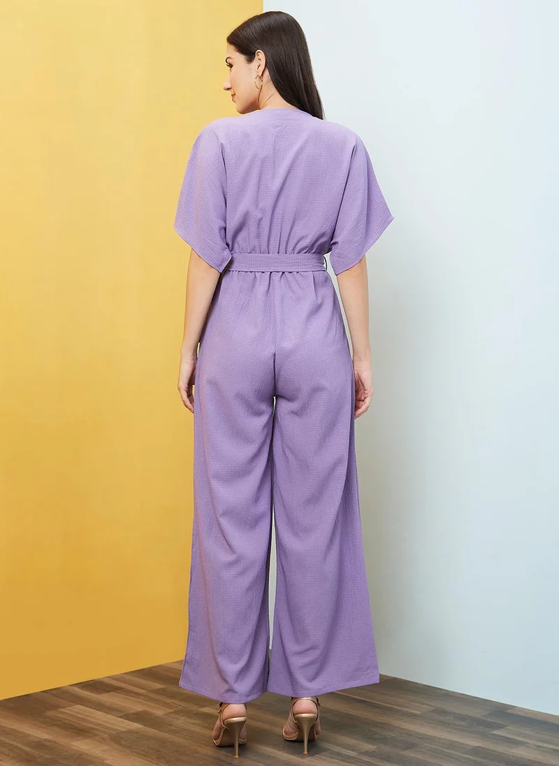 Globus Lavender Globus Women's Lavender Self Design Casual Jumpsuit with Round Neck V Cut Kimono Sleeves and Belted Waist for Women | Best Price UAE