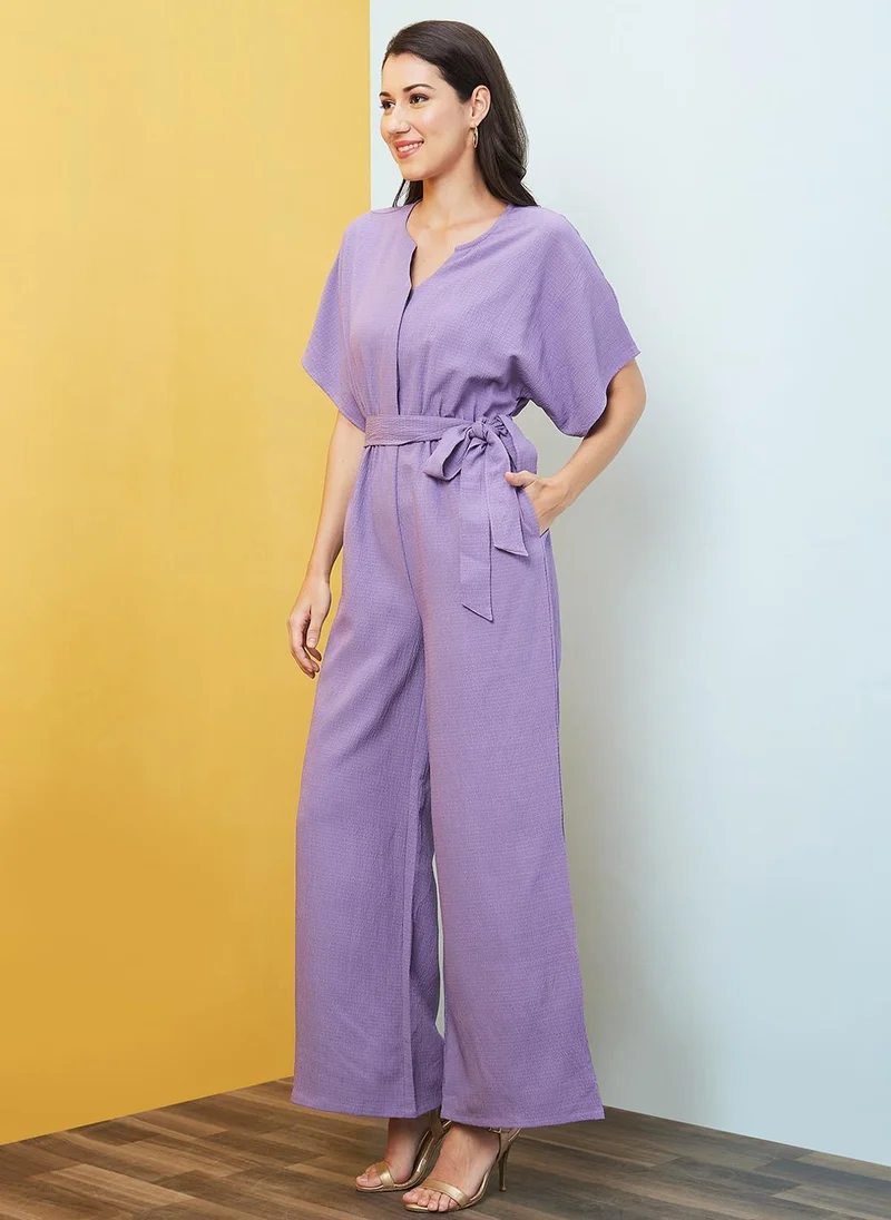 Globus Lavender Globus Women's Lavender Self Design Casual Jumpsuit with Round Neck V Cut Kimono Sleeves and Belted Waist for Women | Best Price UAE
