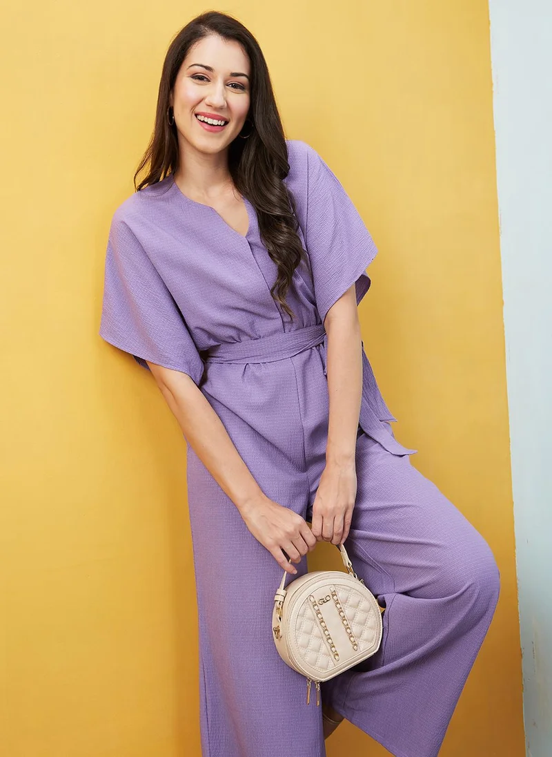 Globus Lavender Globus Women's Lavender Self Design Casual Jumpsuit with Round Neck V Cut Kimono Sleeves and Belted Waist for Women | Best Price UAE