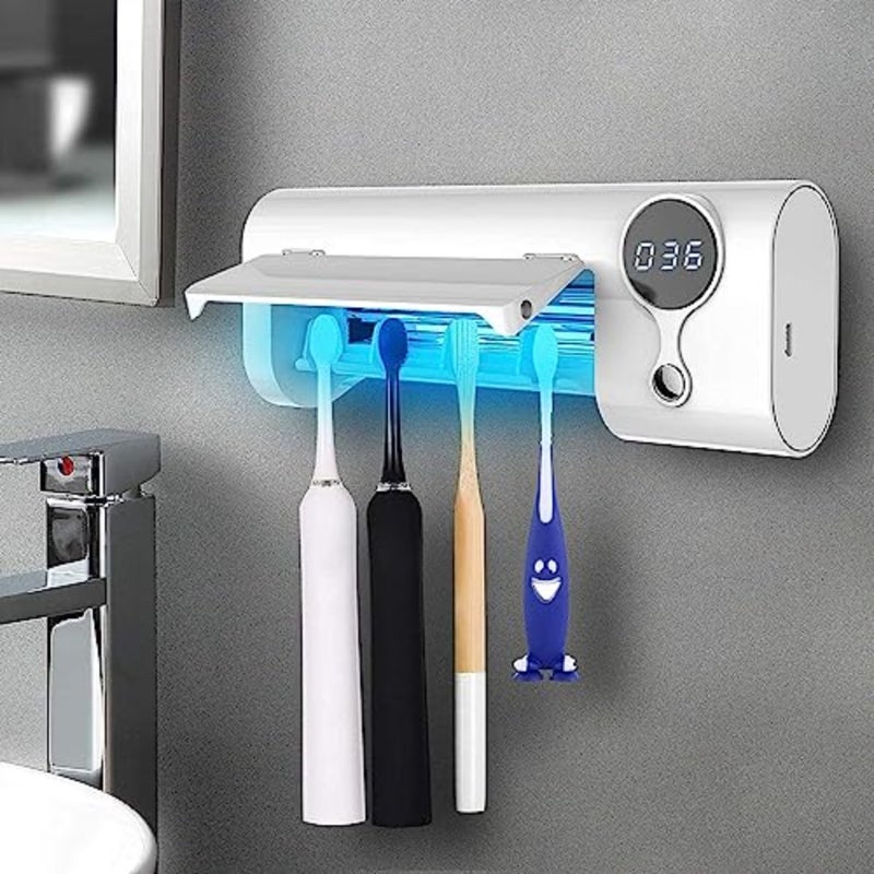 Wall-mounted UV toothbrush sanitizer for bathroom use, ABS plastic body in white, 99.9 sterilization with rechargeable drilling-free design - Image 1