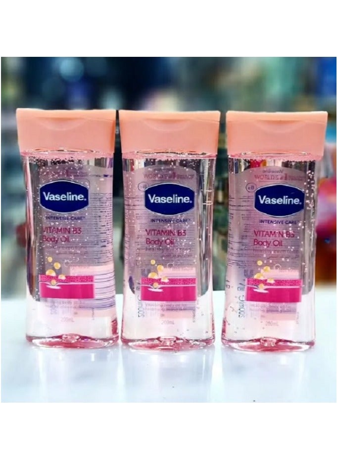 فازلين زيت الجسم للعناية المركزة بفيتامين ب3 200 مل، عبوة من 3 قطع - Image 1