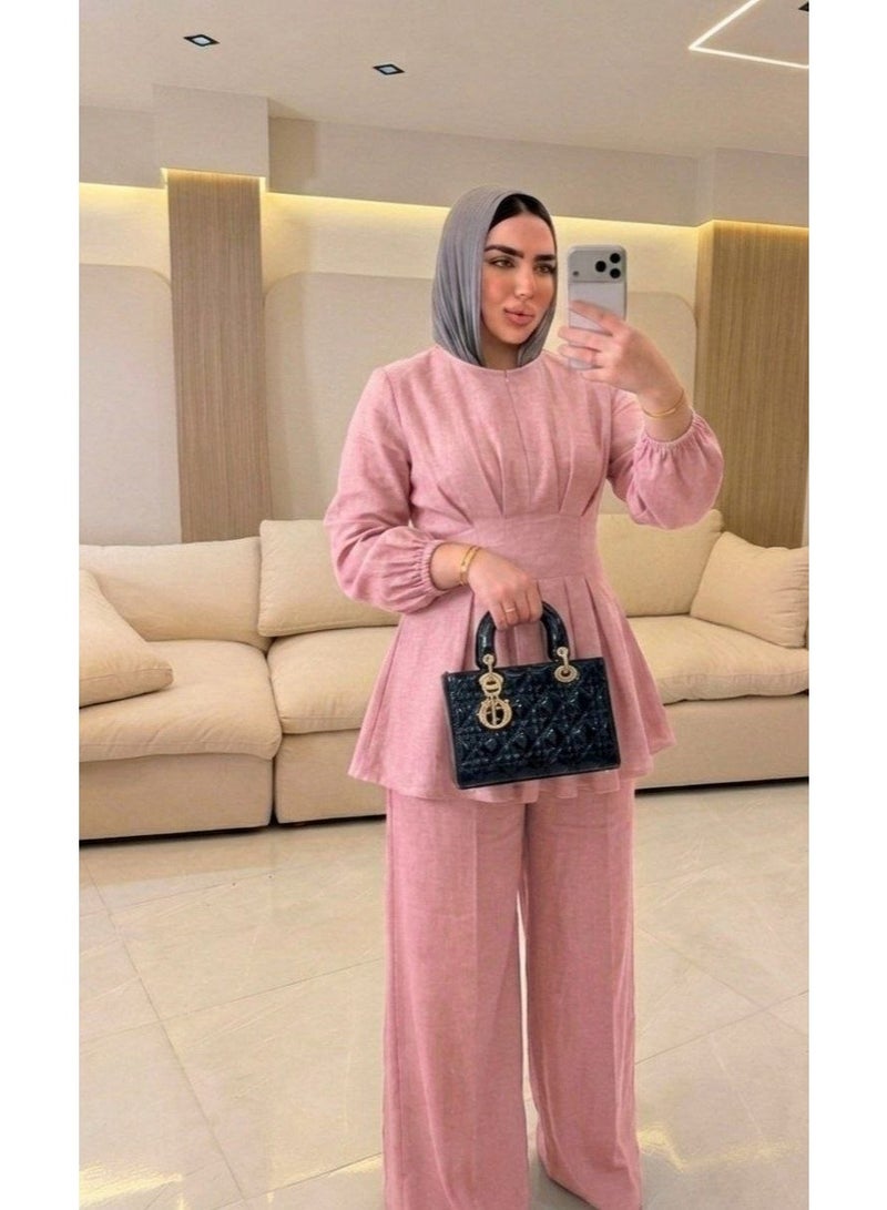 طقم سوت حريمي قطعتين كاجوال شيك  بلوزة ڤرونس بحركات مميزة + بنطلون وايد ليج  كتان فرنساوي معالج مستورد عالي الجودة  مقاس مناسب من 70 إ كجم – كود 214 باللون البينك - Image 2
