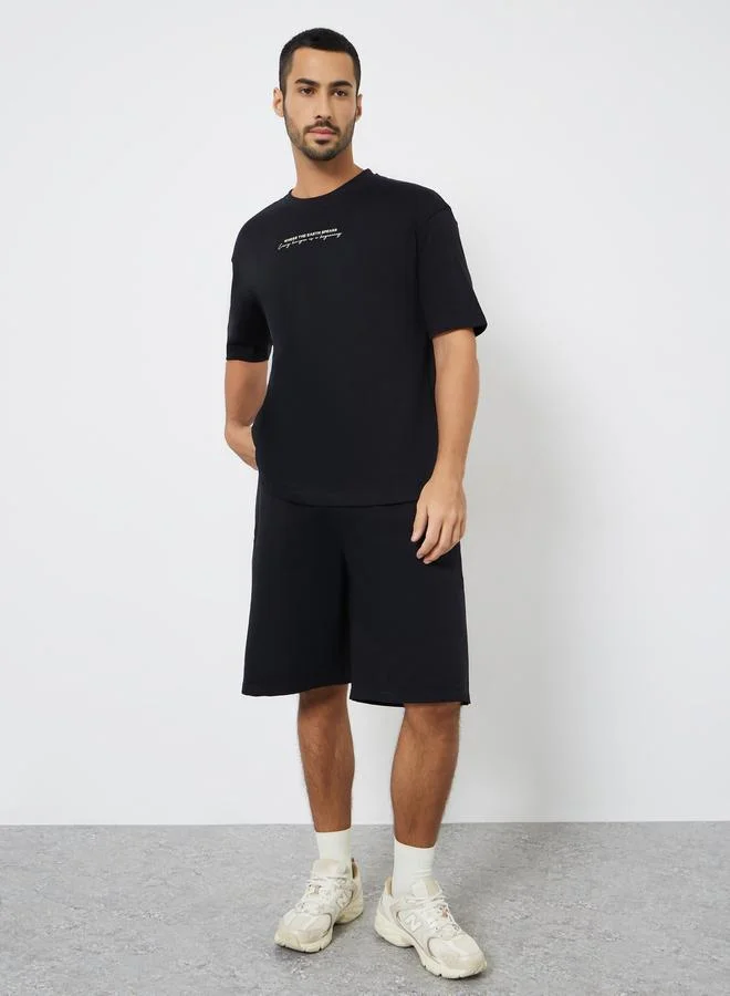 Styli Men Black Graphic Print Oversized T-Shirt