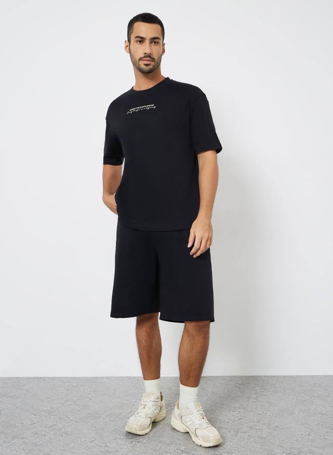 ستايلي تيشيرت بقصة واسعة وطبعة جرافيك - Image 1