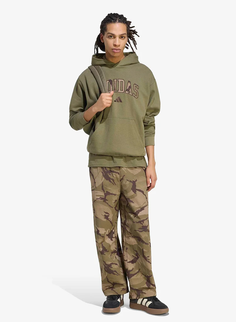 Adidas MULTCO/AUCO/OLISTR/KH Camo Woven Parachute Sweatpants for Men | Best Price UAE