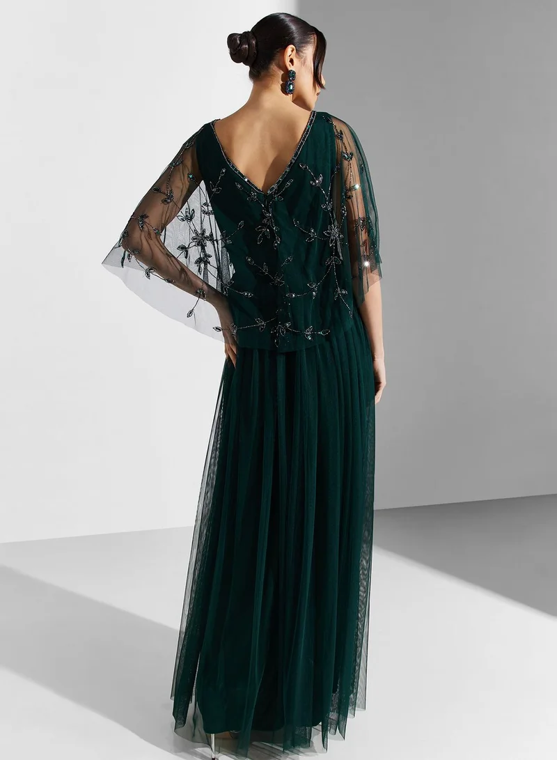 namshi evening dresses Tadashi Shoji Sagamore Ribbon Flower Embellished Gown main image 0
