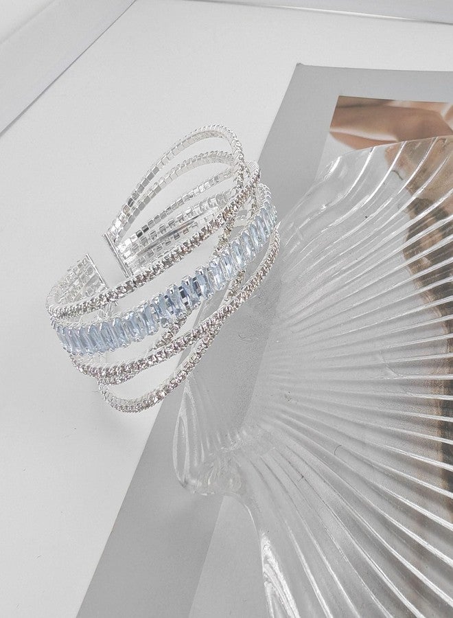 سوار YBMYCM متعدد الطبقات مرصع بأحجار الراين الكريستالية، ذهبي وفضي، مناسب للنساء كإكسسوار مجوهرات لحفلات التخرج والزفاف والمواعدة (فضي كبير) - Image 4