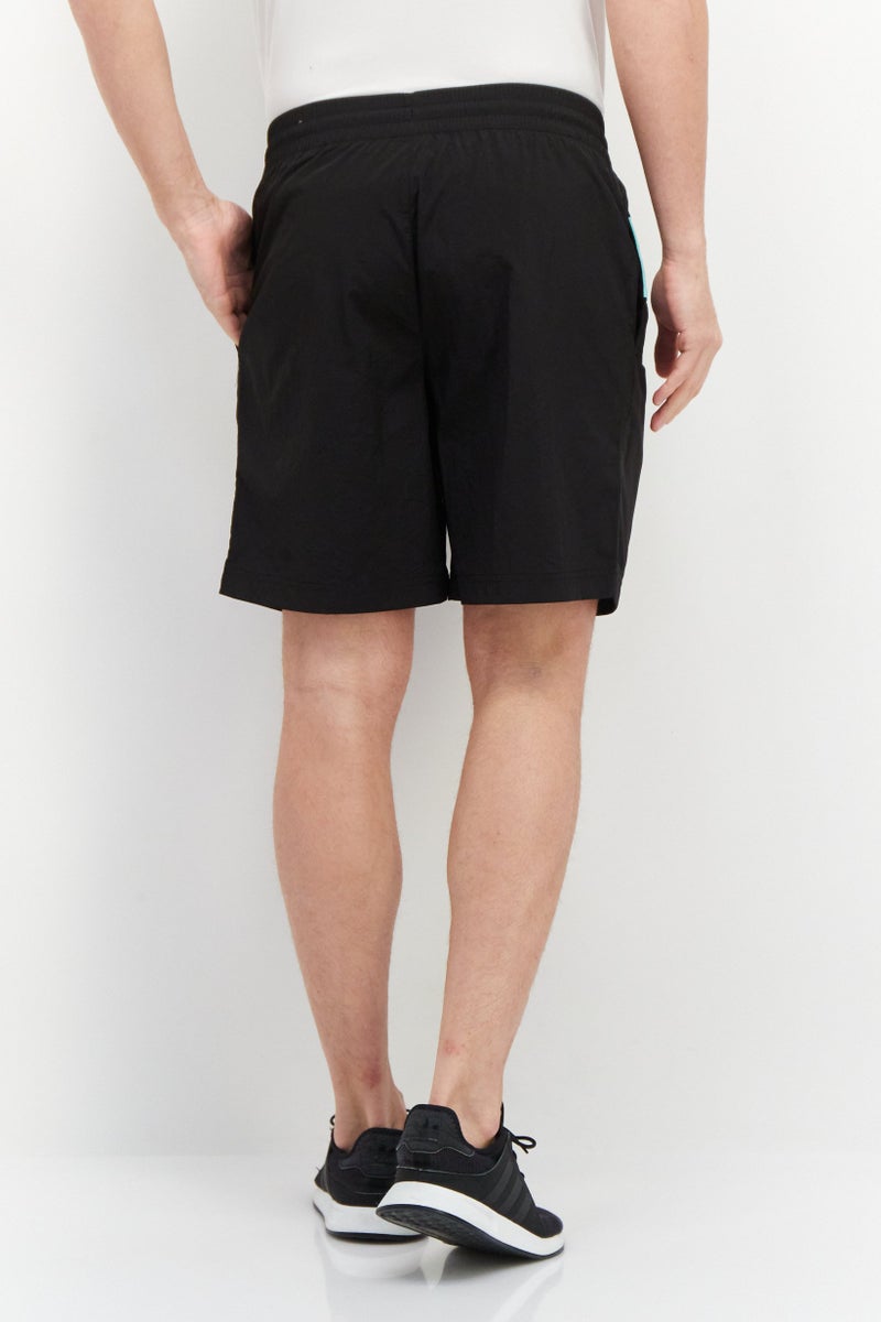 PUMA شورتات تدريبية للرجال بقصة مريحة بشعار العلامة التجارية، أسود - Image 2