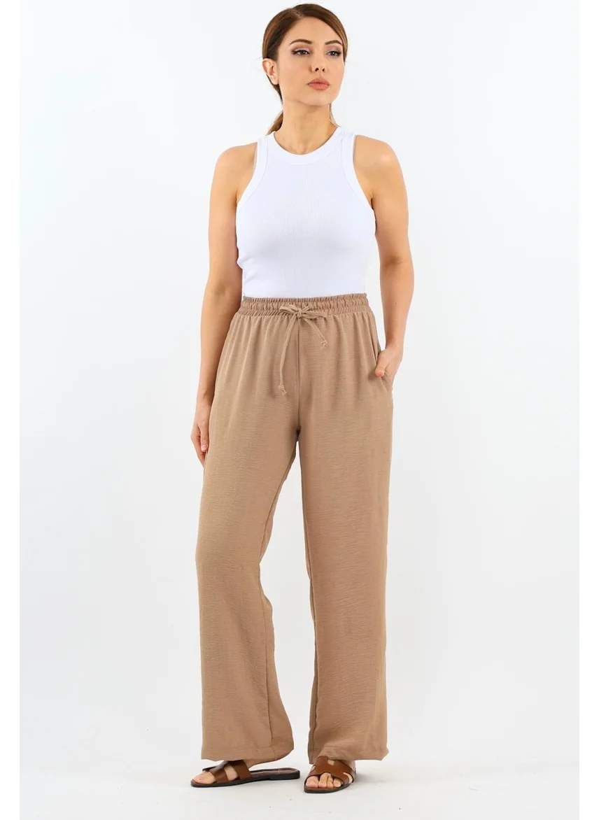 Ritnice Women's Relaxed Beige Elastic Waist Straight Cut Pocket Ayrobin Trousers