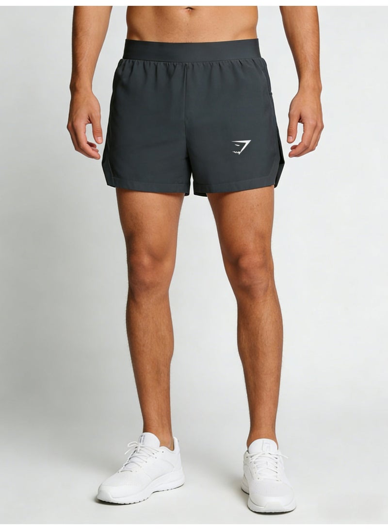 جيمشارك شراويل رياضية Gymshark للرجال باللون الرمادي الفحمي سريعة الجفاف - Image 1
