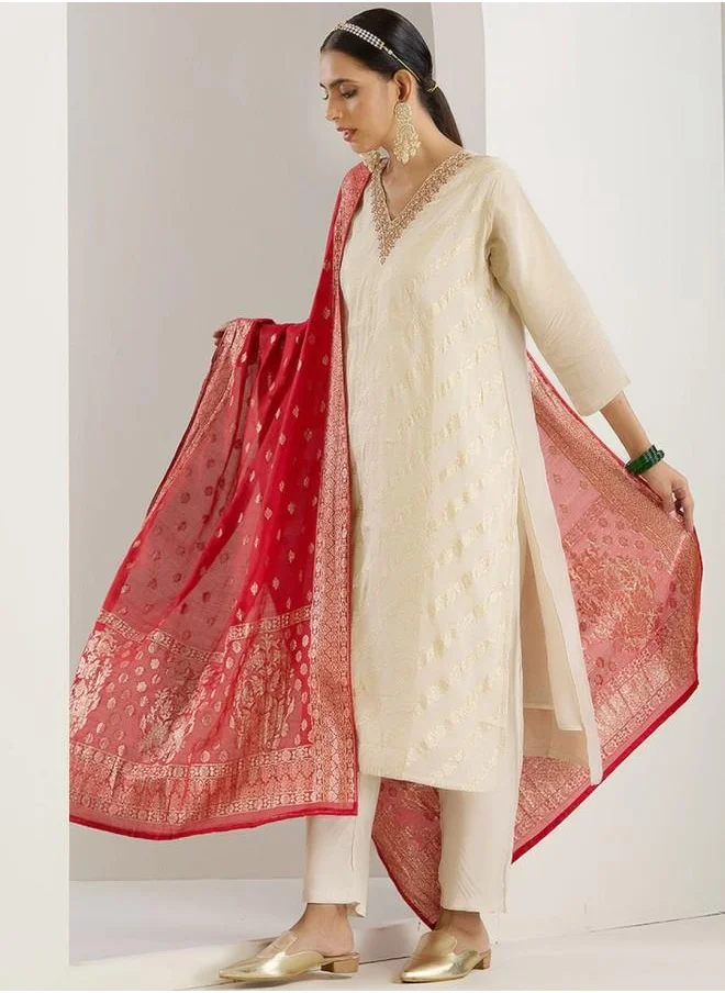 ISHIN Palazzo Women White Poly silk Kurta Set with Embroidered pattern Tunic and Palazzo features a Round neckline and Three-Fourth Sleeve secured with Elastic closure and styled in Straight Fit ideal for Festive moments — a must-have for your statement wardrobe.