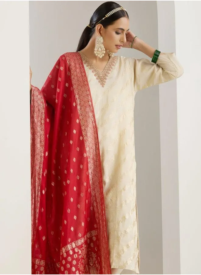 ISHIN Palazzo Women White Poly silk Kurta Set with Embroidered pattern Tunic and Palazzo features a Round neckline and Three-Fourth Sleeve secured with Elastic closure and styled in Straight Fit ideal for Festive moments — a must-have for your statement wardrobe.