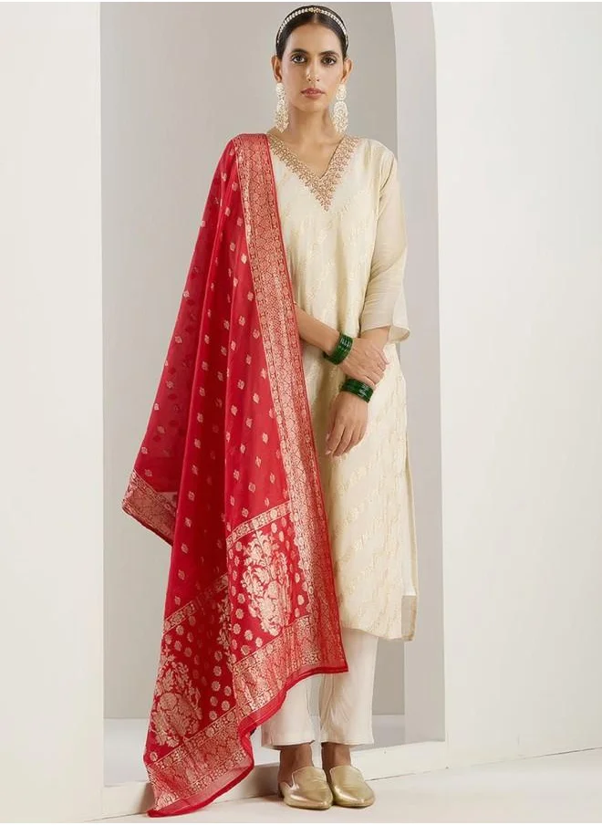 ISHIN Palazzo Women White Poly silk Kurta Set with Embroidered pattern Tunic and Palazzo features a Round neckline and Three-Fourth Sleeve secured with Elastic closure and styled in Straight Fit ideal for Festive moments — a must-have for your statement wardrobe.