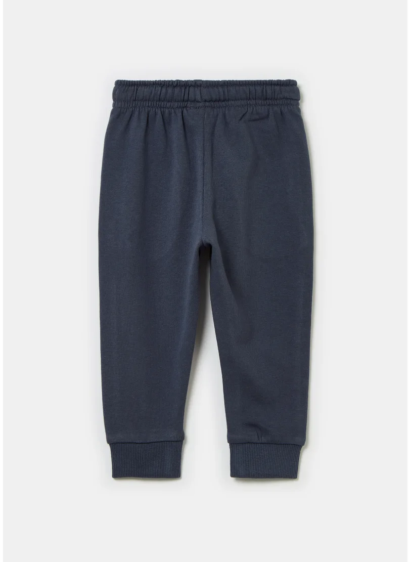او في اس Fleece joggers with drawstring and print