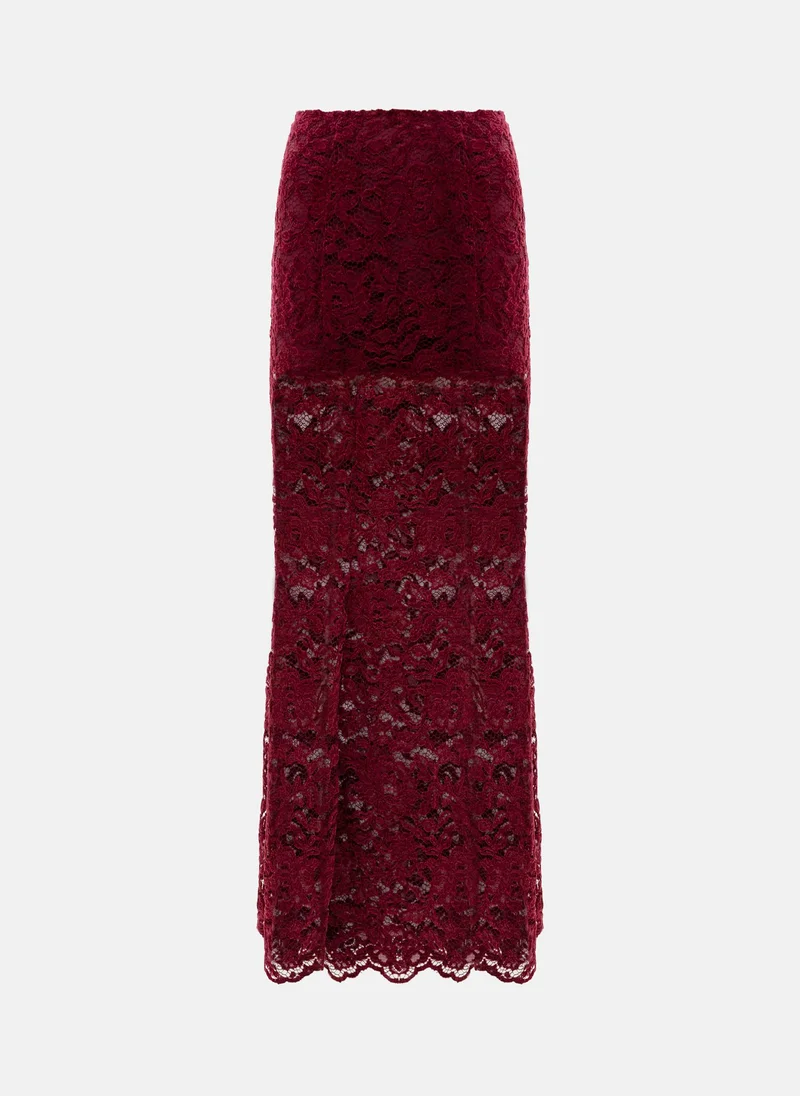 ليتشي تنورة ميدي دانتيل مع شورت كاروهات