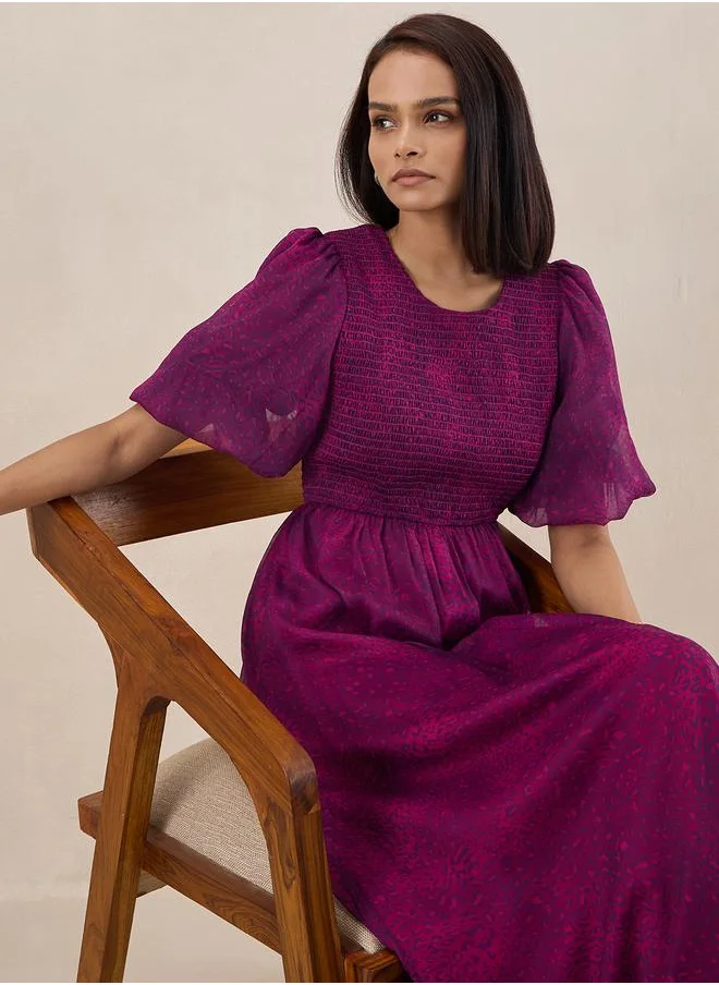 FEMELLA Animal Print Smocked Maxi Dress by Styli