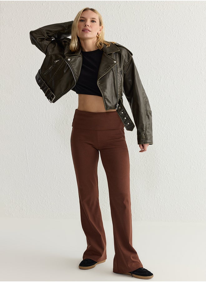 Brown Flare/Spanish Elastic Interlock Trousers with Waist Detail TWOAW25PL00005 - pzsku/Z95291453A35726BB5B38Z/45/_/1739718381/ab95fd5e-58ee-4e6c-9d91-2cc5c1ecae92