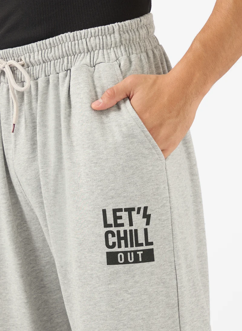 Seventy Five Basics  Text Print Open Hem Joggers for Men | Best Price UAE