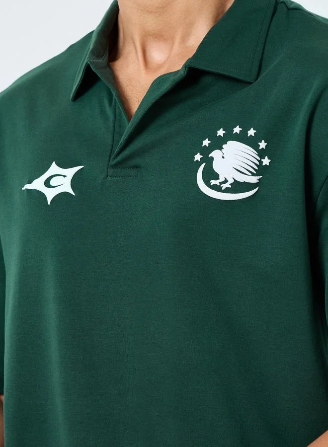 ستايلي قميص بولو بطبعة جرافيك وقصة واسعة للرجال