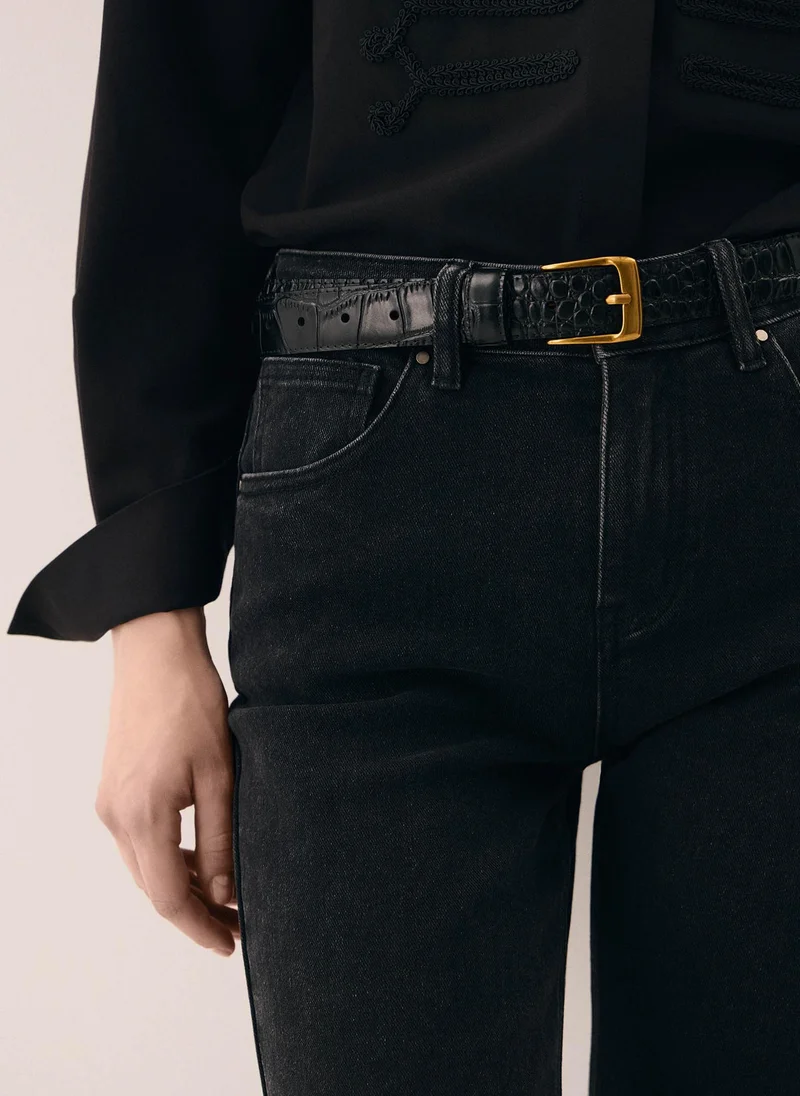 Textured leather belt with golden buckle