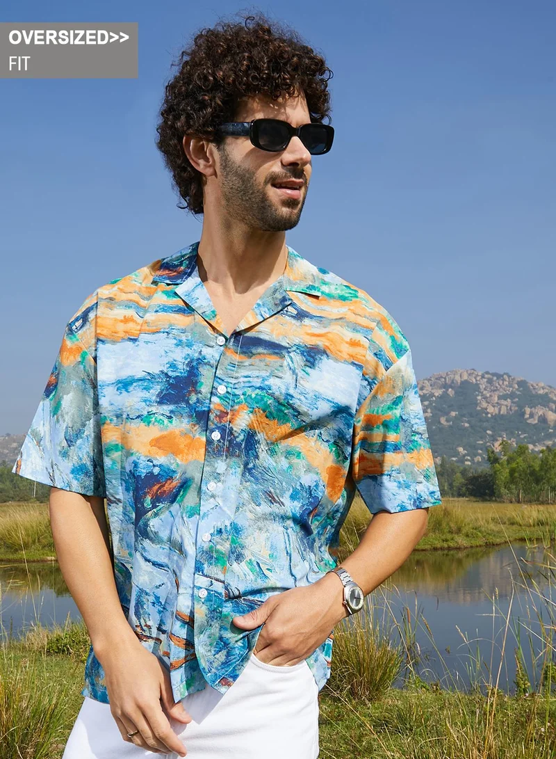 كامبوس سوترا قميص رجالي واسع أزرق وبرتقالي من كامبس سوترا للملابس الكاجوال بياقة كوبانية وأكمام قصيرة مكبلة وإغلاق بأزرار