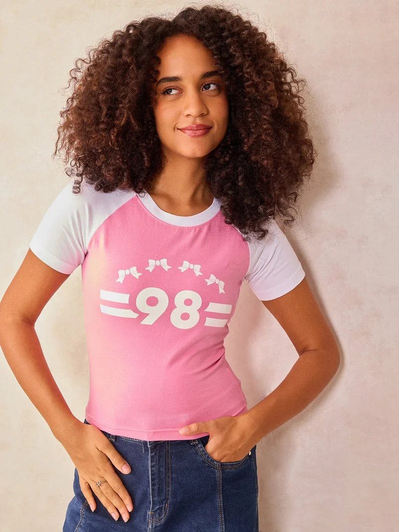 Pink Raglan Cropped Top With Graphic Print