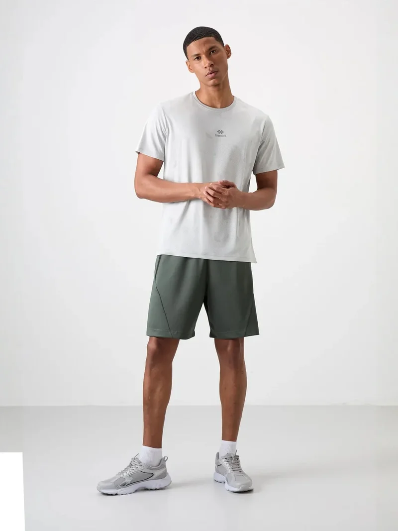 تومي لايف TOMMY Men's Solid Bird's Eye Crew Neck T-Shirt