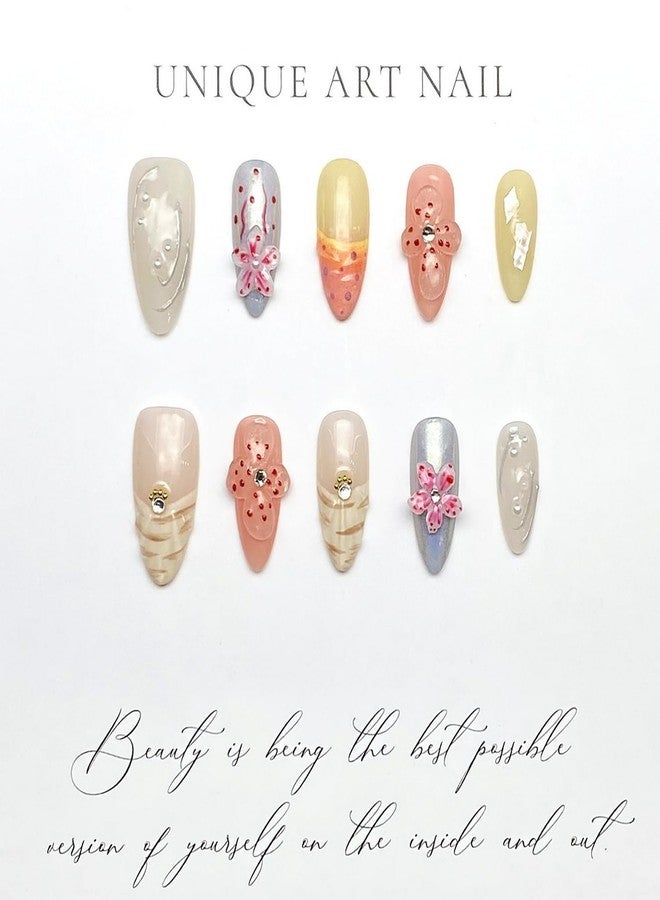 أظافر صناعية يدوية الصنع، متوسطة الحجم، لون لوز، مزينة بزهرة ثلاثية الأبعاد، أظافر صناعية فريدة بتصميمات مميزة، مرصعة بأحجار الراين واللؤلؤ، لامعة، لاصقة، قابلة لإعادة الاستخدام، أظافر أكريليك سميكة، 10 قطع (متوسطة) - Image 4