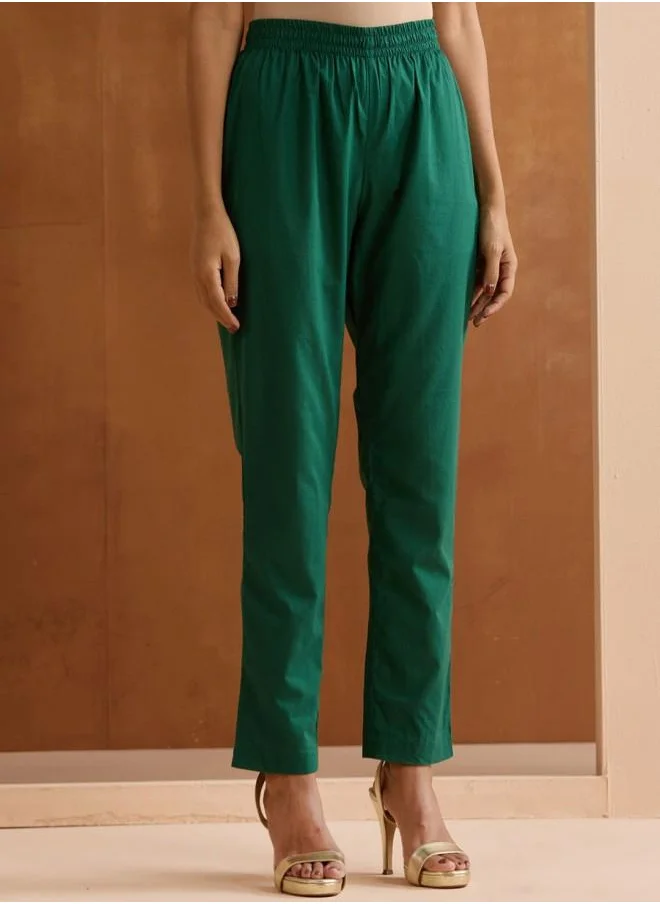 آي شين Three-Fourth Sleeve Women Green Cotton Kurta Set with Embroidered pattern Tunic and Palazzo features a Round neckline and Three-Fourth Sleeve secured with Elastic closure and styled in Straight Fit ideal for Festive moments — exude elegance in every glance.