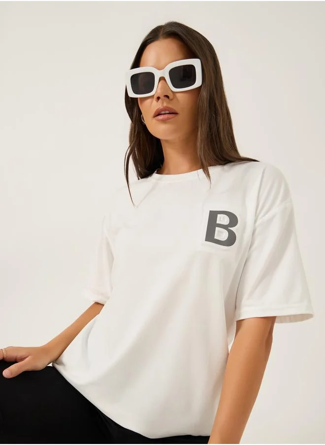 ستايلي Styli Solid Loose Fit Round Neck T-Shirt