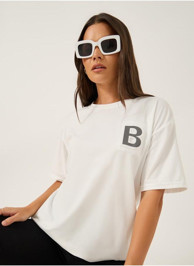 Styli Styli Solid Loose Fit Round Neck T-Shirt  - Image 1