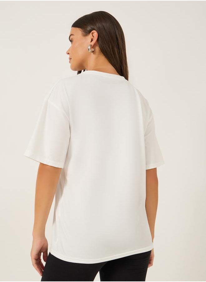 Styli Styli Solid Loose Fit Round Neck T-Shirt  - Image 5
