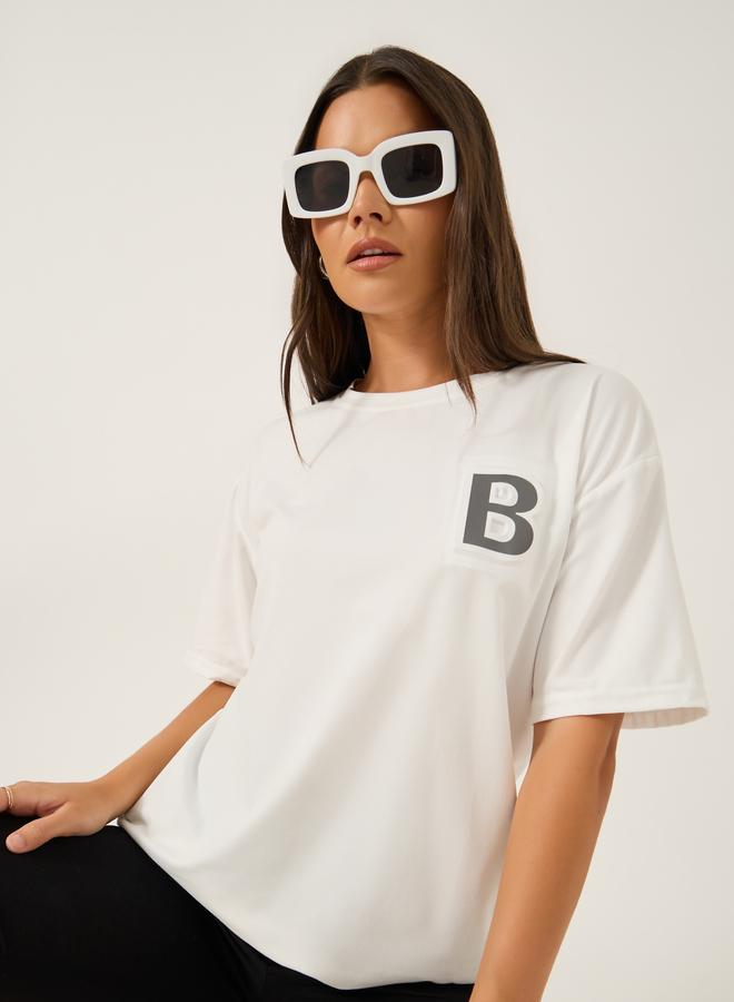 Styli Solid Loose Fit Round Neck T-Shirt - Image 1