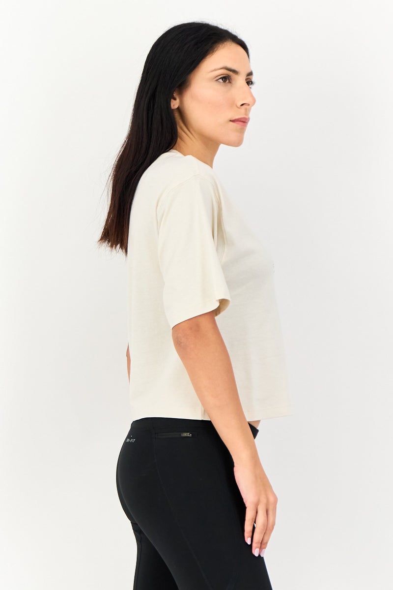 PUMA تي شيرت رياضي نسائي بأكمام قصيرة مناسب في الهواء الطلق، بيج - Image 4