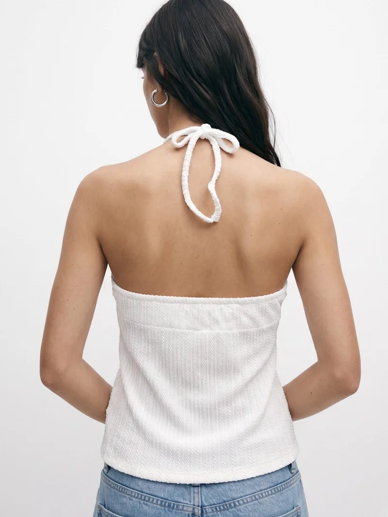 Outzidr  White Textured Knit Halter Neck With Tiered Hem for Women | Best Price UAE