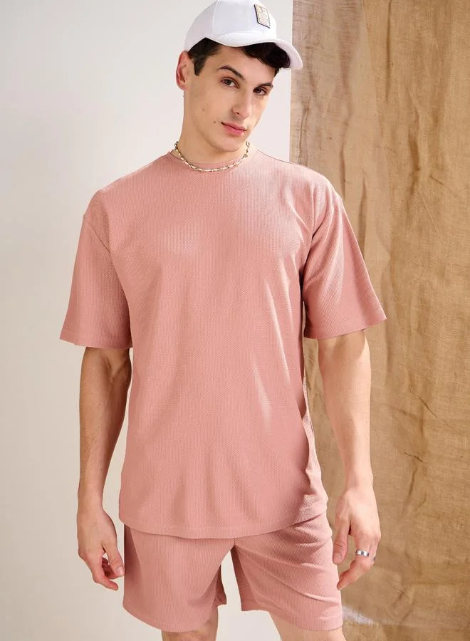 SASSAFRAS Sassafras Men Pink Waffle Textured Oversized T-Shirt and Shorts Co-Ords