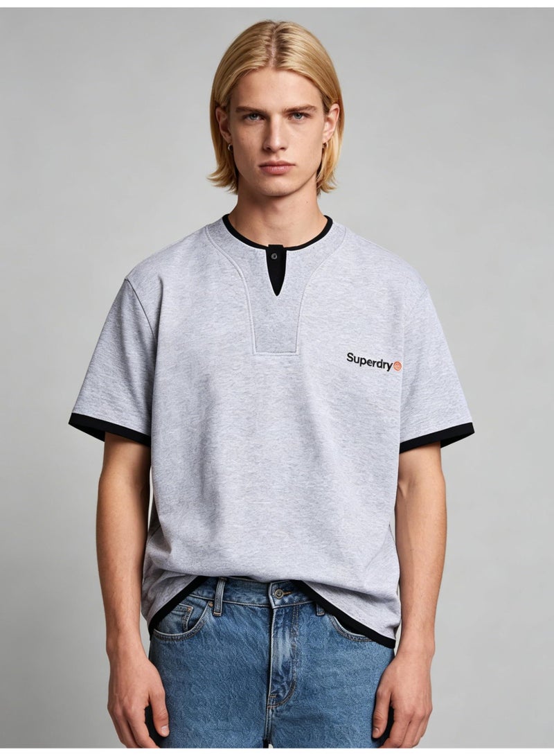 سوبر دراي Superdry couple fake two pieces of Henry collar short sleeve contrast loose T-shirt casual sports shirt for men and women. - Image 1