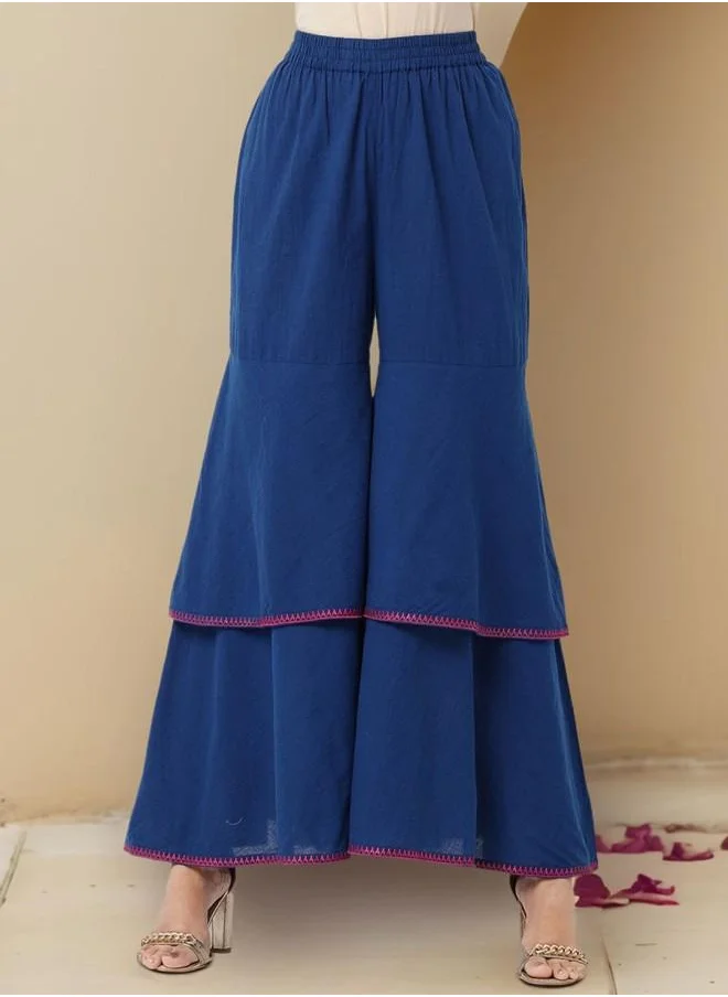 آي شين Tunic Women Blue Cotton Kurta Set with Embroidered pattern Tunic and Palazzo features a Round neckline and Three-Fourth Sleeve secured with Elastic closure and styled in Straight Fit ideal for Festive moments — designed to make heads turn.