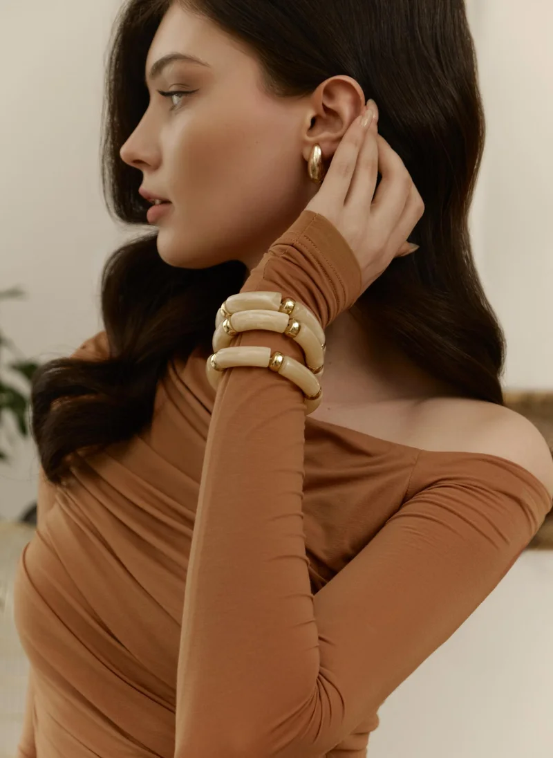 Lichi Set of three bracelets with golden inserts