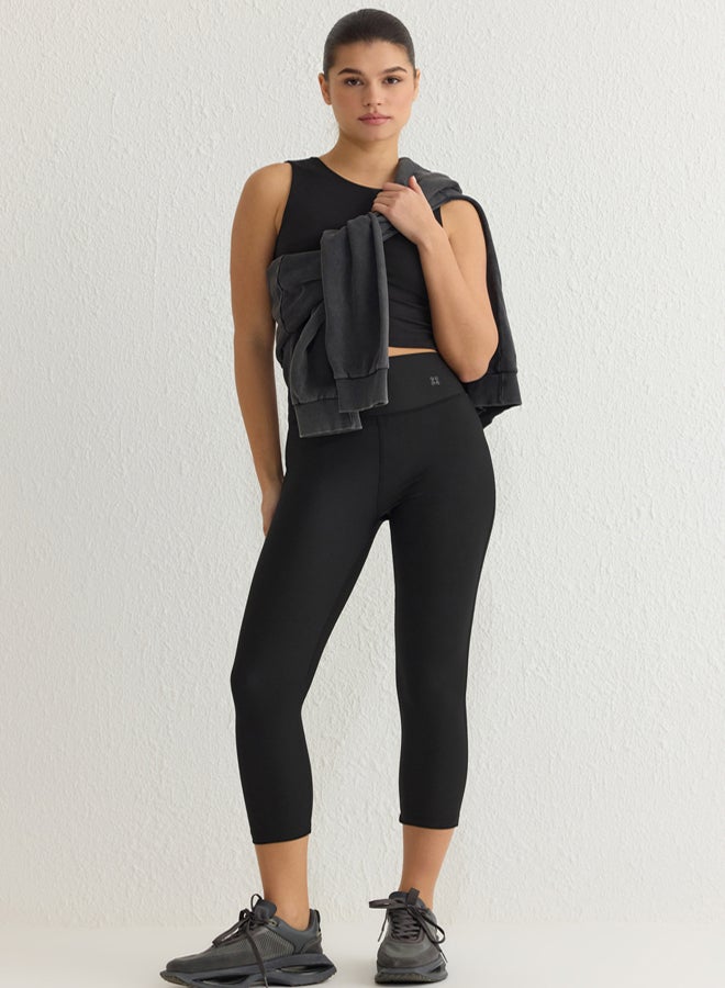 trendyol Black Reflective Print Detail Capri Length Knitted Sports Tights THMSS25TY00001 - Image 1