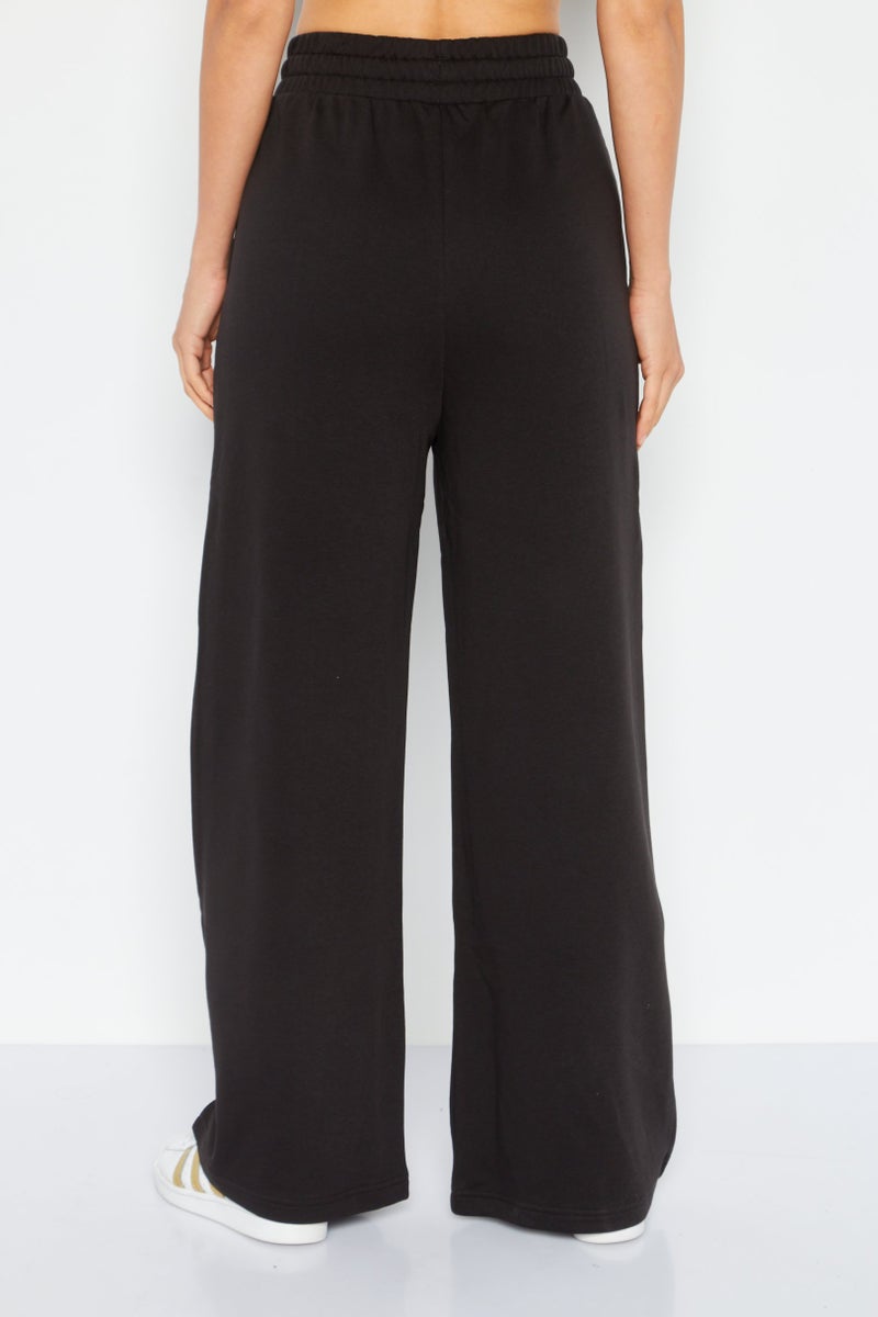 PUMA Women Relaxed Fit Training Pants, Black - Image 4