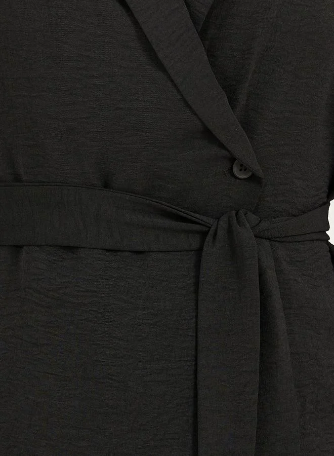 Styli Black Solid Wrap Belted Blouse