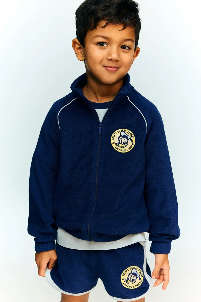 اتش اند ام جاكيت رياضي مُطرز من التيري