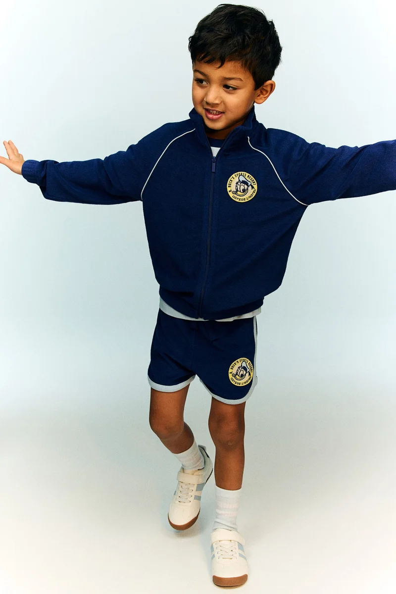 اتش اند ام جاكيت رياضي مُطرز من التيري