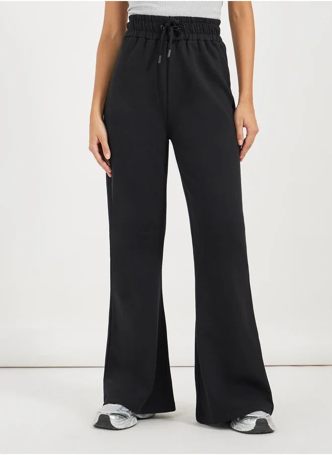 ستايلي Styli Solid Drawstring Waist Flared Joggers