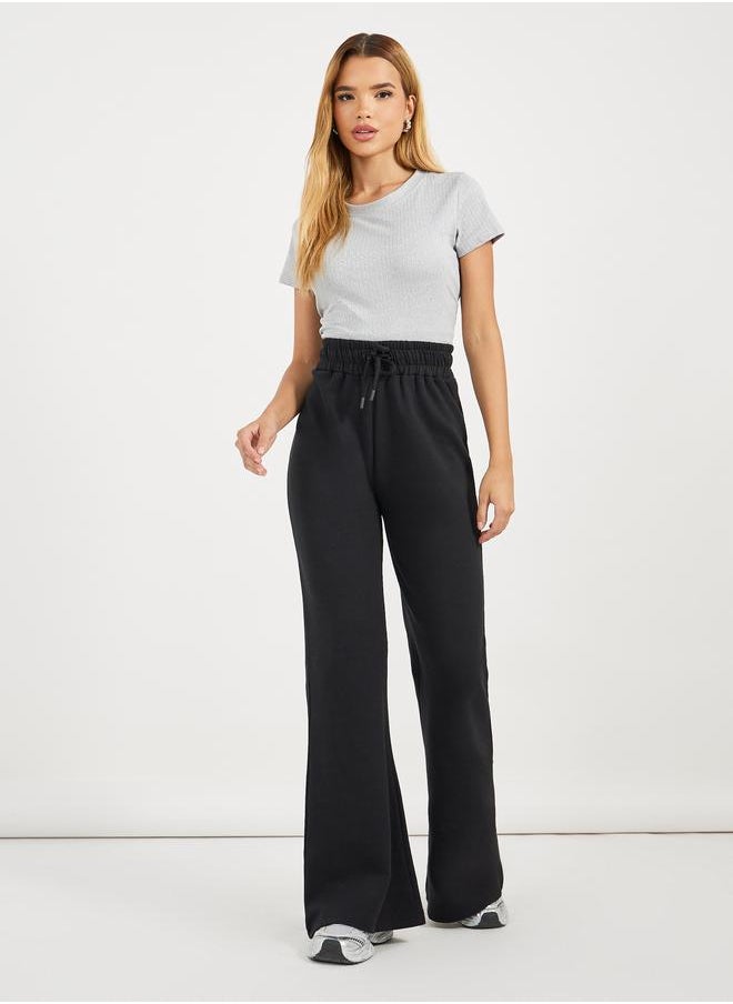 Styli Styli Solid Drawstring Waist Flared Joggers  - Image 1