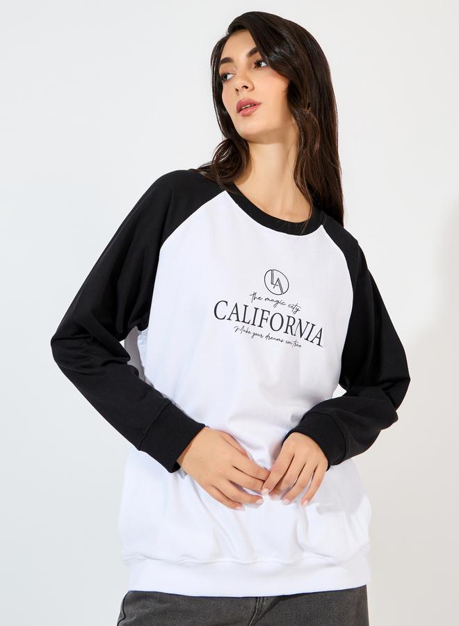 Styli Oversized Longline Slogan Print Sweatshirt - Image 1